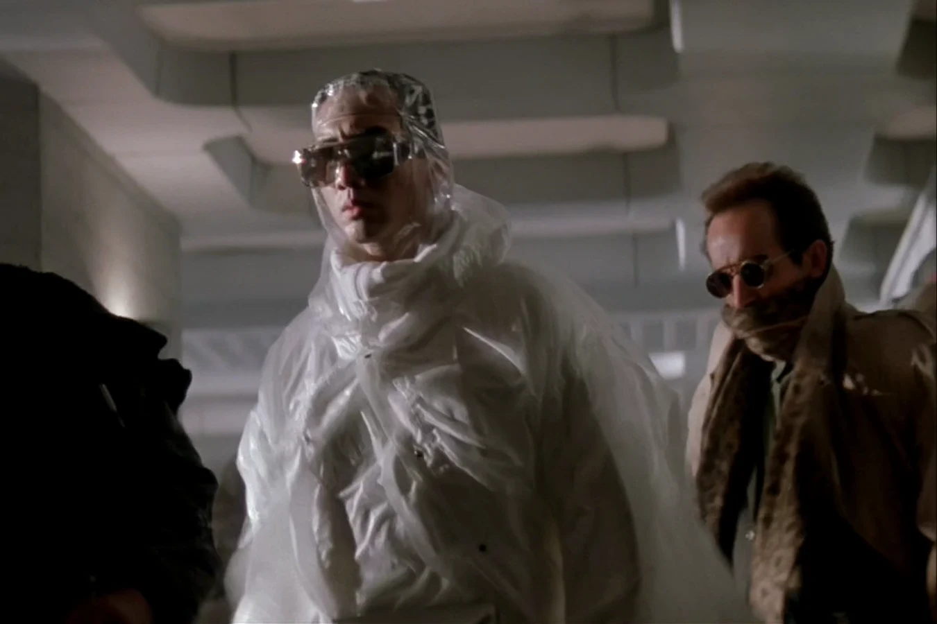 Sora Matsushita in a sealed plastic suit walking with Michael Bishop on Fury 161