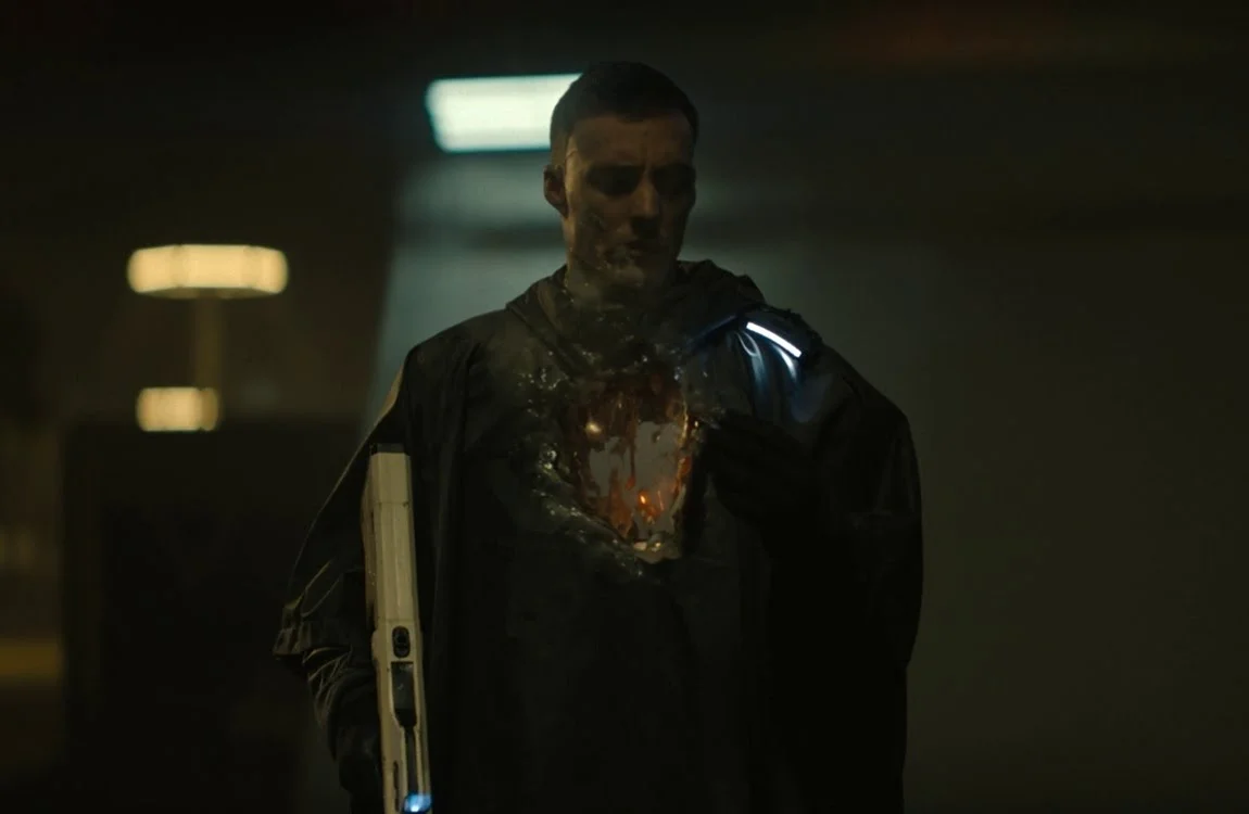 A Weyland-Yutani android melting from the effect of Squirt's spray attack