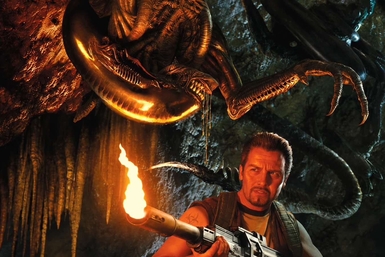 An adult Xenomorph hanging above a man with a flamethrower, from the Aliens: Criminal Enterprise cover