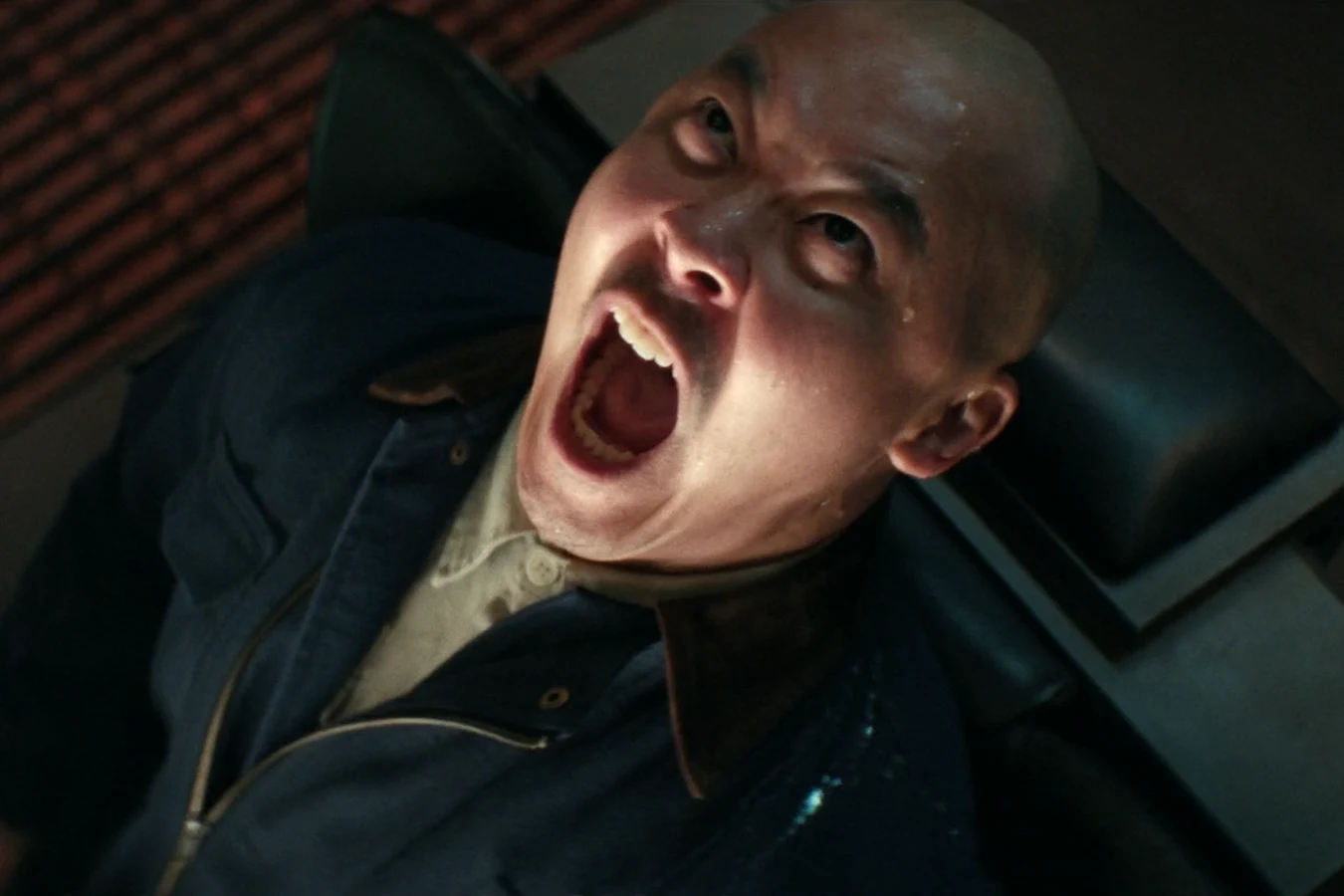 Teng screaming in terror as the Xenomorph attacks him aboard the Maginot in Alien: Earth