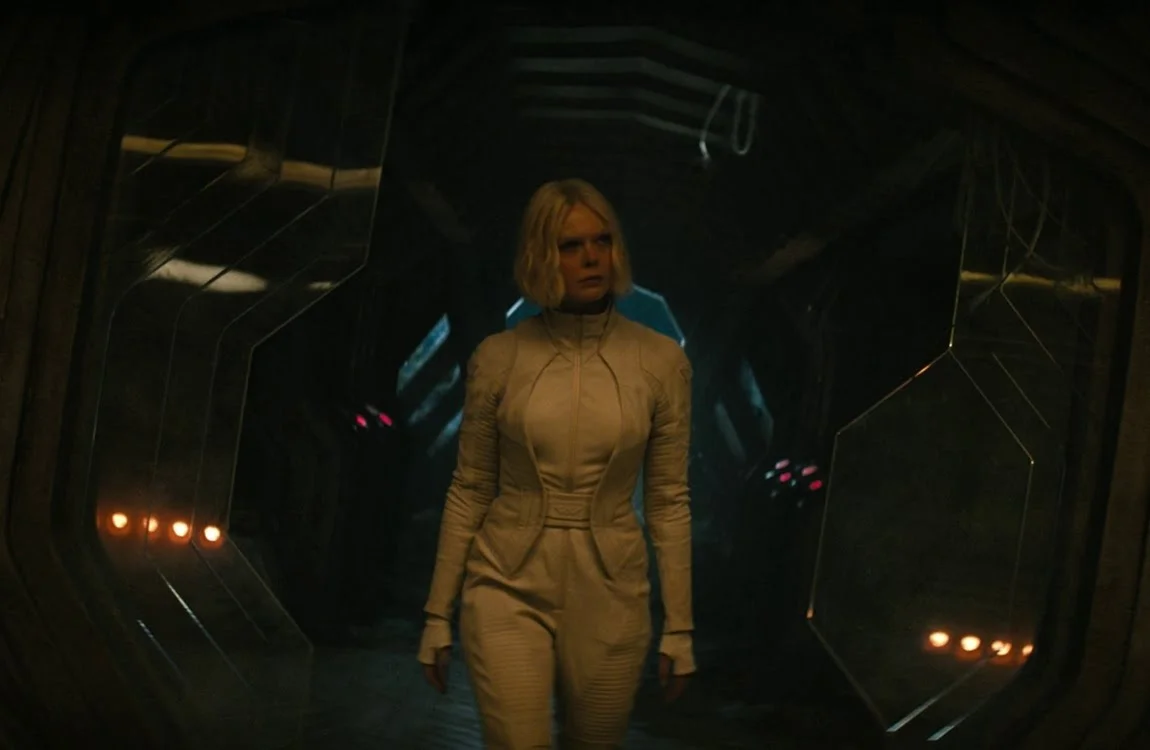 Tessa standing in Kwei's ship