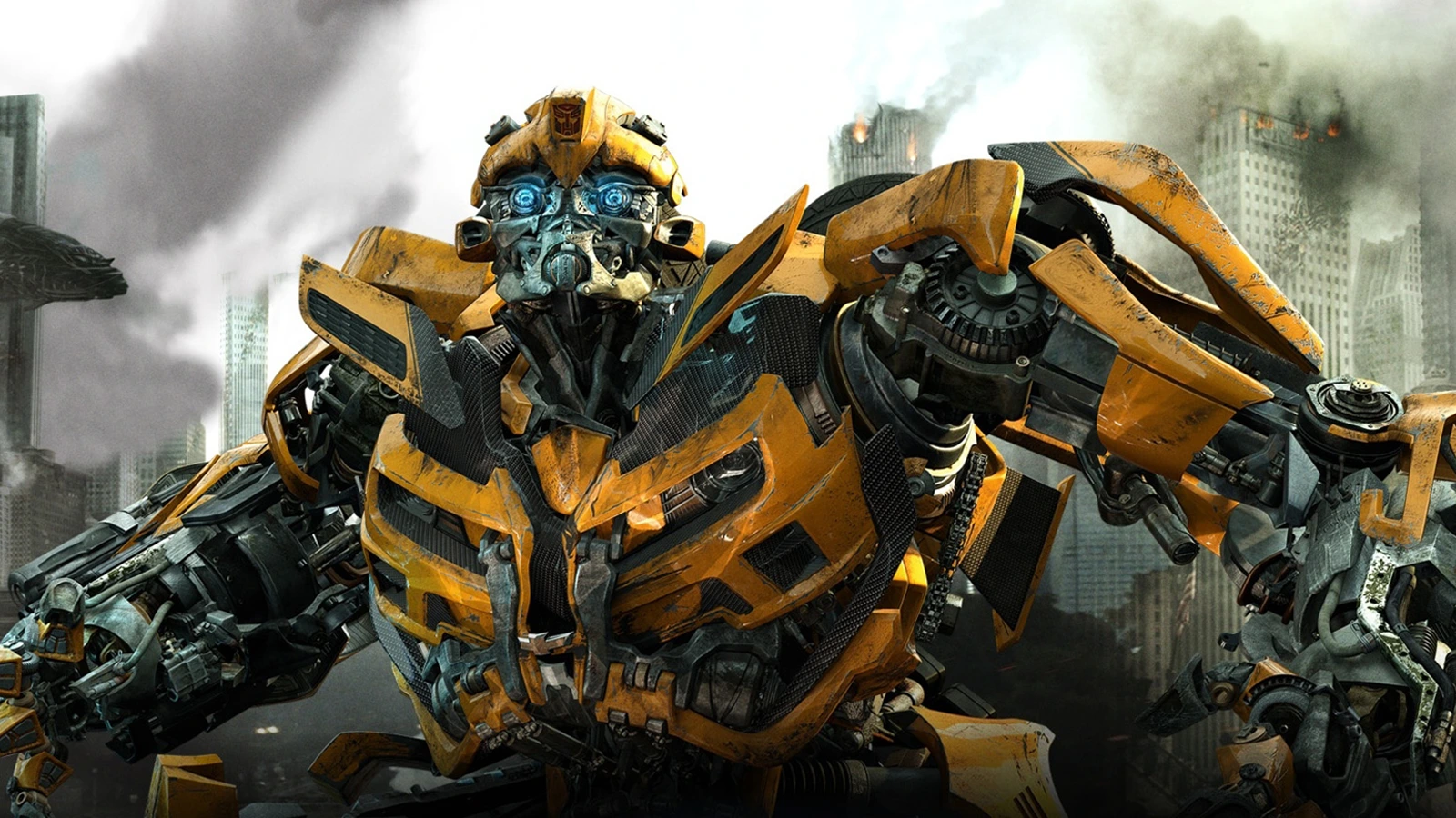 Bumblebee, a yellow and black Autobot from the live-action Transformers films, standing in a smoky ruined city