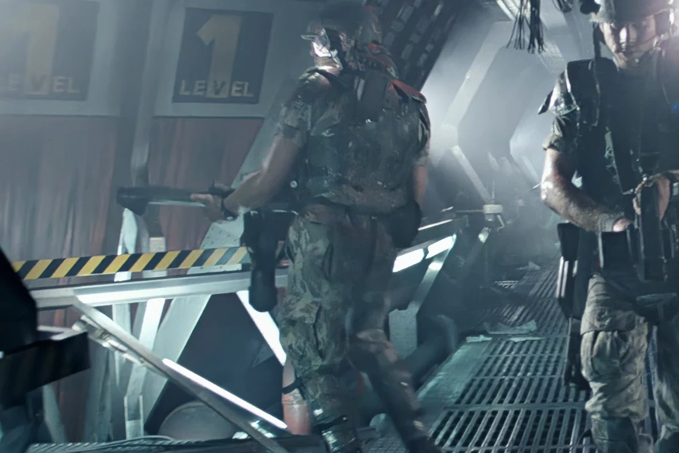 Wierzbowski walking a Hadley's Hope corridor with an M240 flamethrower in Aliens