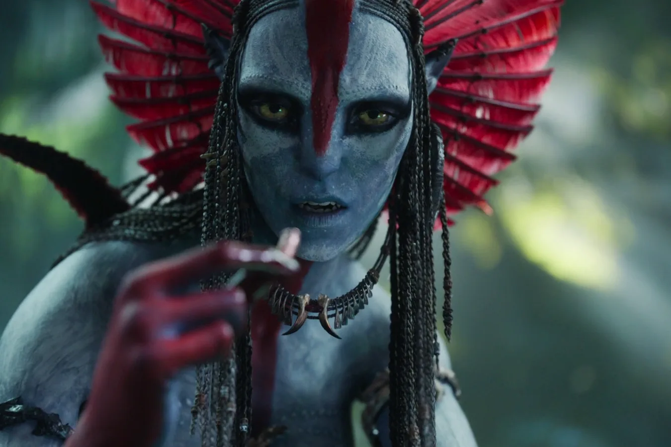 Close-up of Varang with red Ash People war paint and headgear