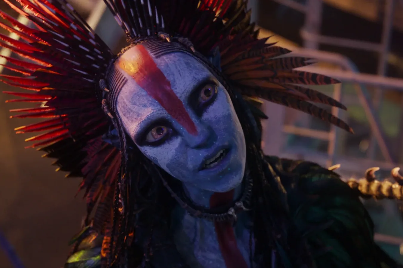 Varang in a dark Mangkwan scene as the matriarch of the Ash People