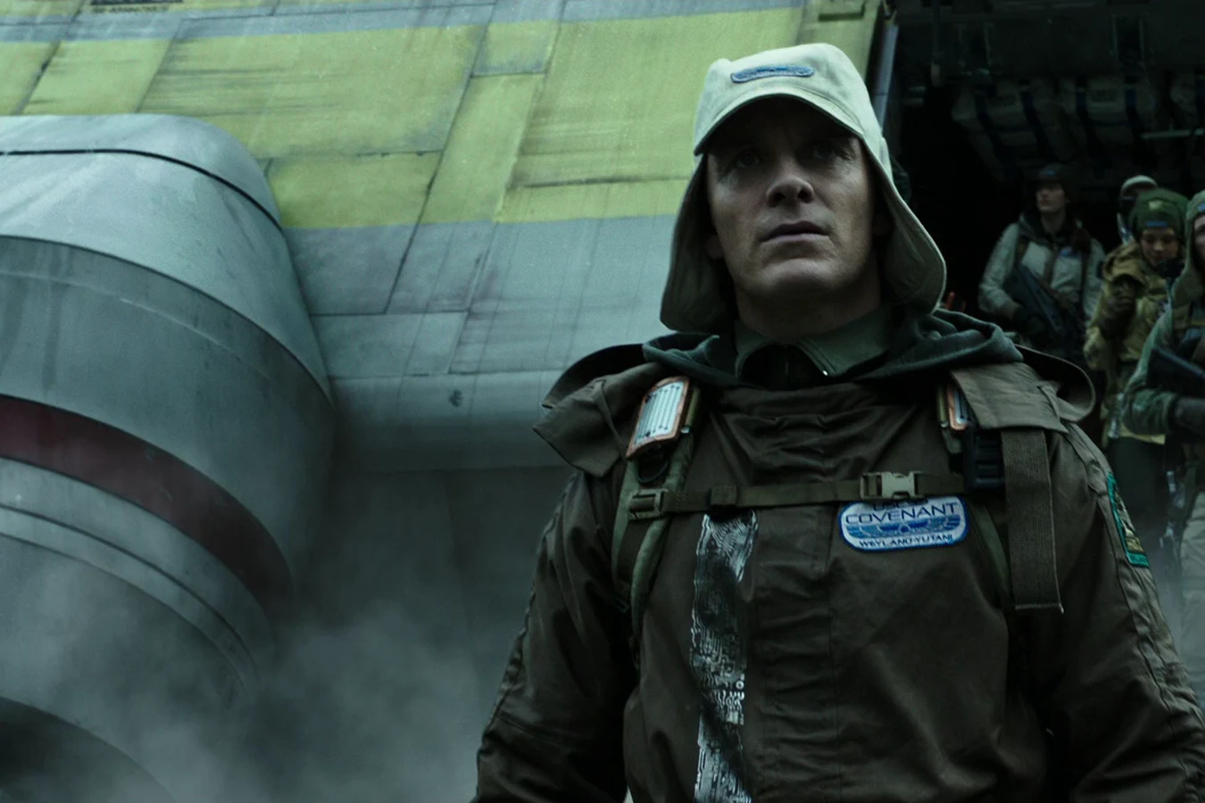 Walter in a Covenant expedition jacket in front of the lander on Planet 4