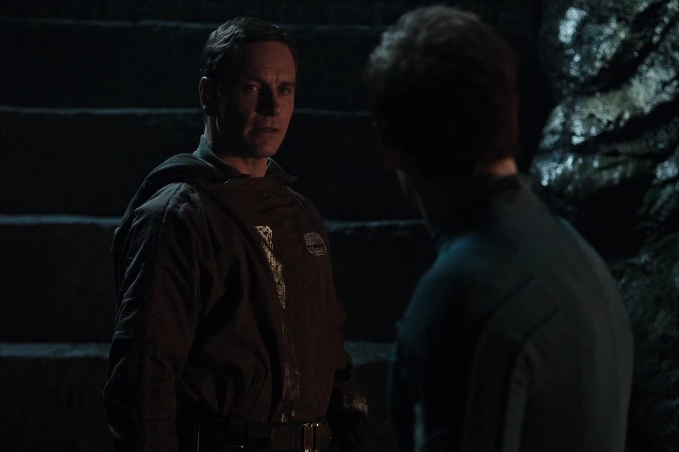 Walter on the stone steps of the Engineer city in Alien: Covenant