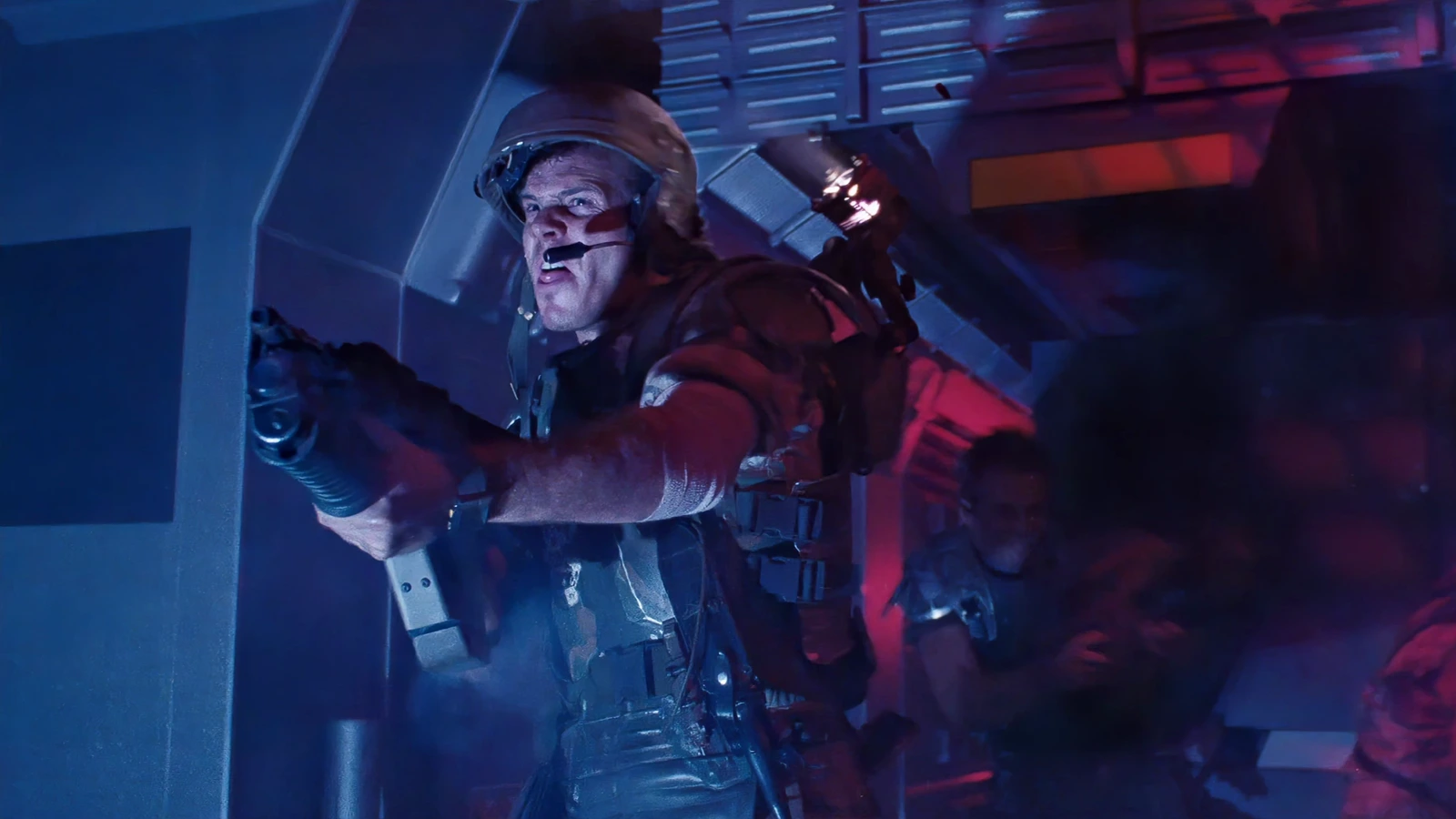 PFC William Hudson firing an M41A Pulse Rifle in a Hadley's Hope corridor in Aliens