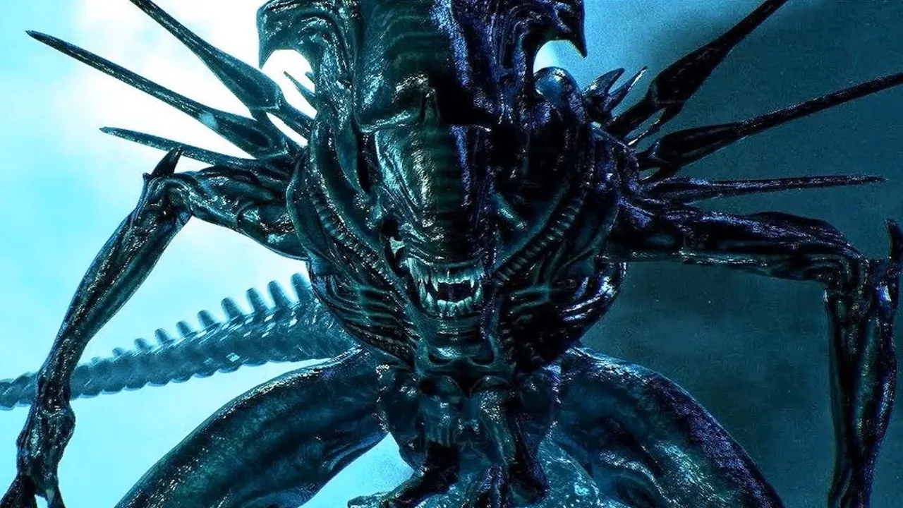 A Xenomorph Queen looming forward with jaws open and inner mouth exposed