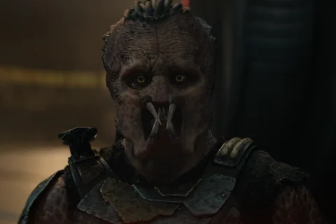 A sad Dek Predator from Predator: Badlands