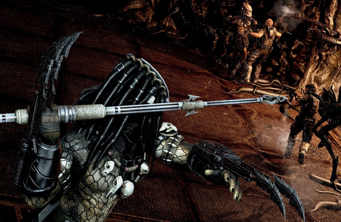 A Predator throwing a spear from Aliens vs. Predator 2010