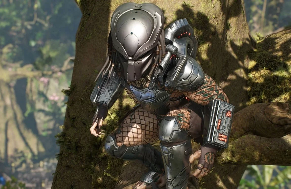 A Predator stalking in the trees in Predator: Hunting Grounds