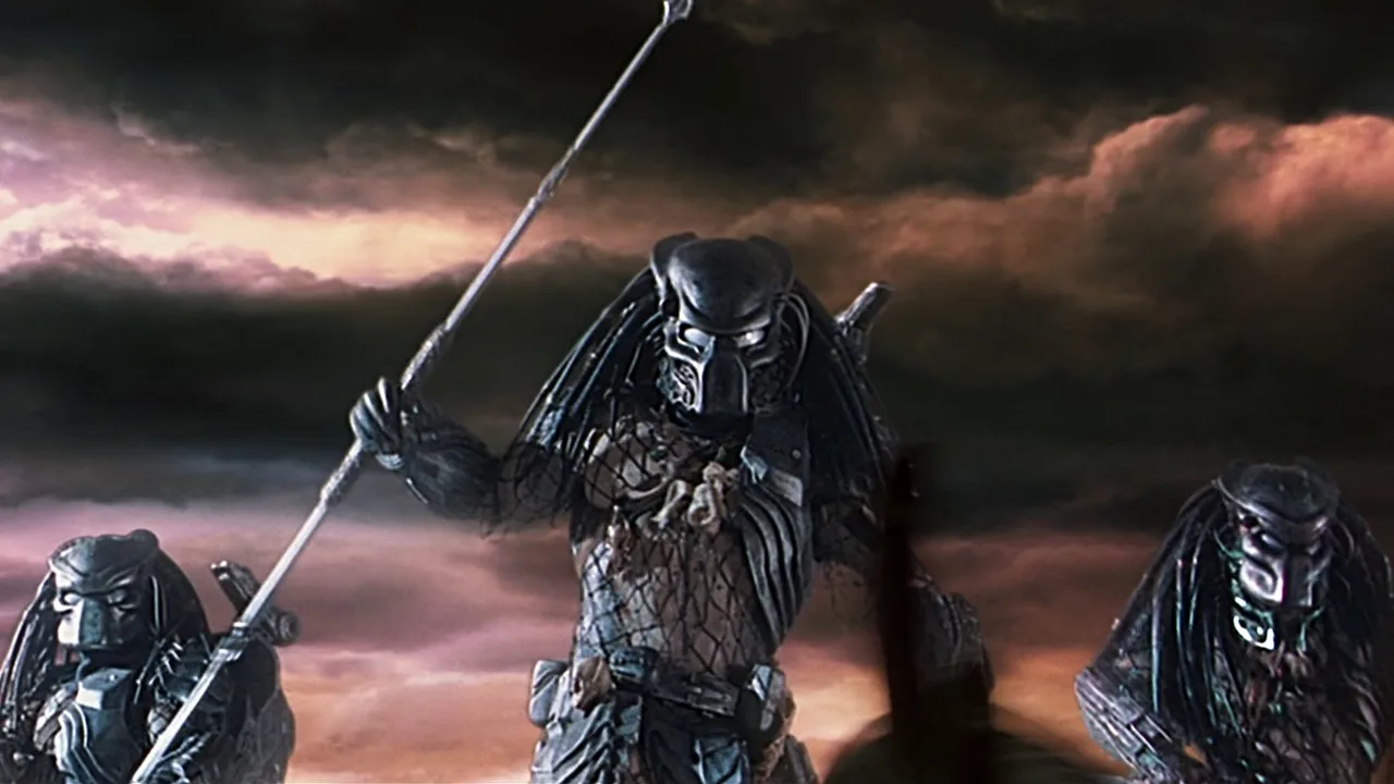 Three Predators battling Xenomorphs on top of an ancient pyramid in Alien vs. Predator (2004)