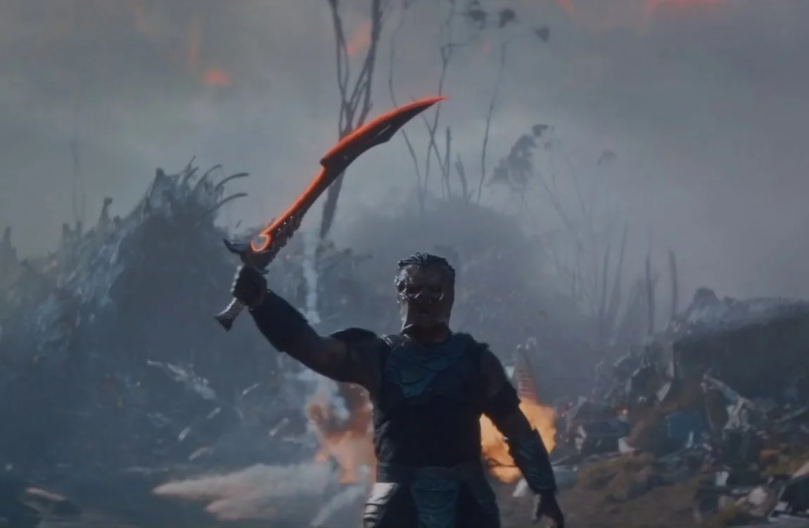 Dek Predator raising a sword to fight the Kalisk