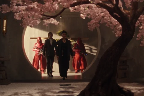 The Yutani family from Alien: Earth with red-armored guards