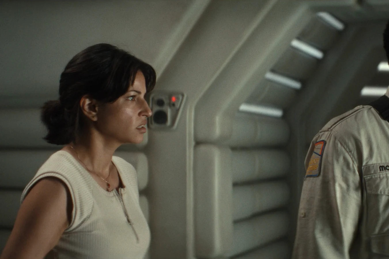Zoya Zaveri outside the Maginot medbay beside Morrow as she authorizes Malachite's surgery in Alien: Earth